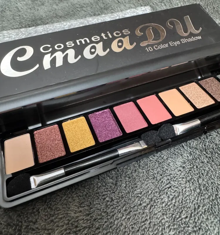 Cmaadu 10 color eyeshadow palette open showing matte and shimmer shades with mirror
